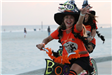 Witches riding a bicycle