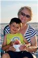 grandmother and grandson eating a snocone