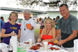 family eating crawfish