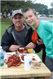 mom and son eating crawfish