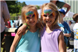two girls with face paintings