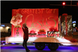 family riding on a float in the parade