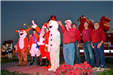 councilmen, frosty the snowman and rudolph on stage