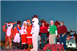 frosty the snowman, rudolph and councilmen on stage