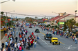 parade floats going down highway 59