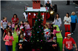 parade floats going down highway 59