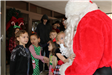 kids greeting Santa