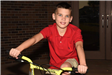 boy on new bicycle
