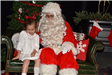child sitting with Santa