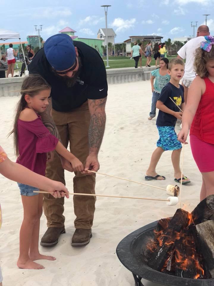 family roasting marshmellows