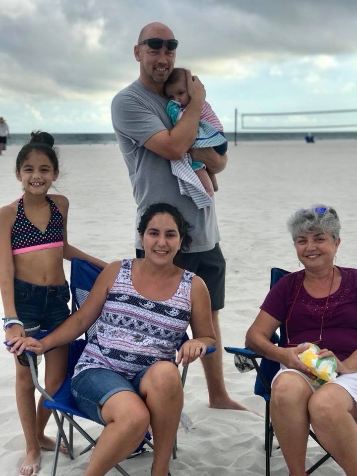 family posing for photo