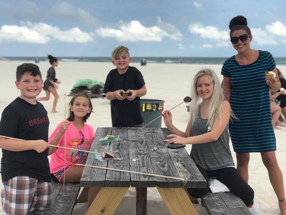 family posing for photo