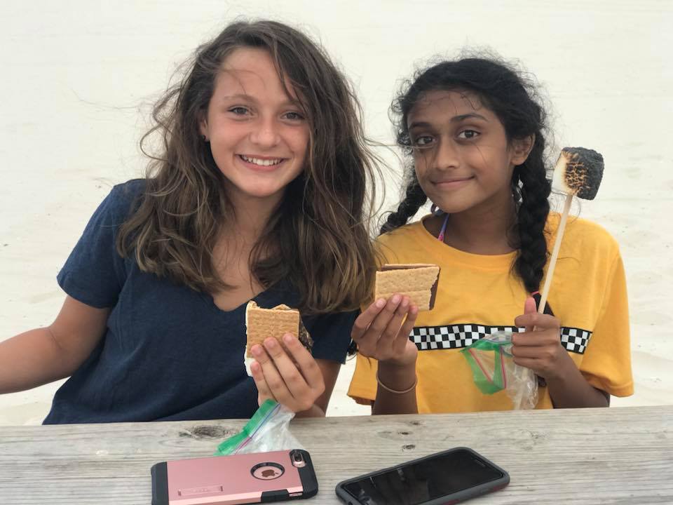girls eating smores
