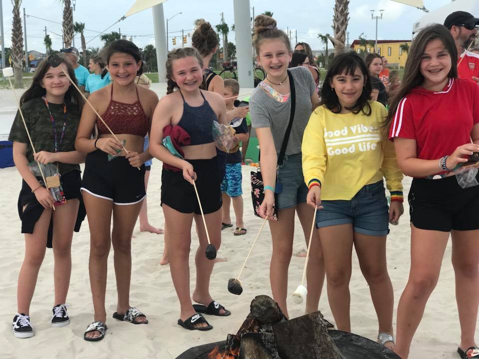 group of girls posing for photo