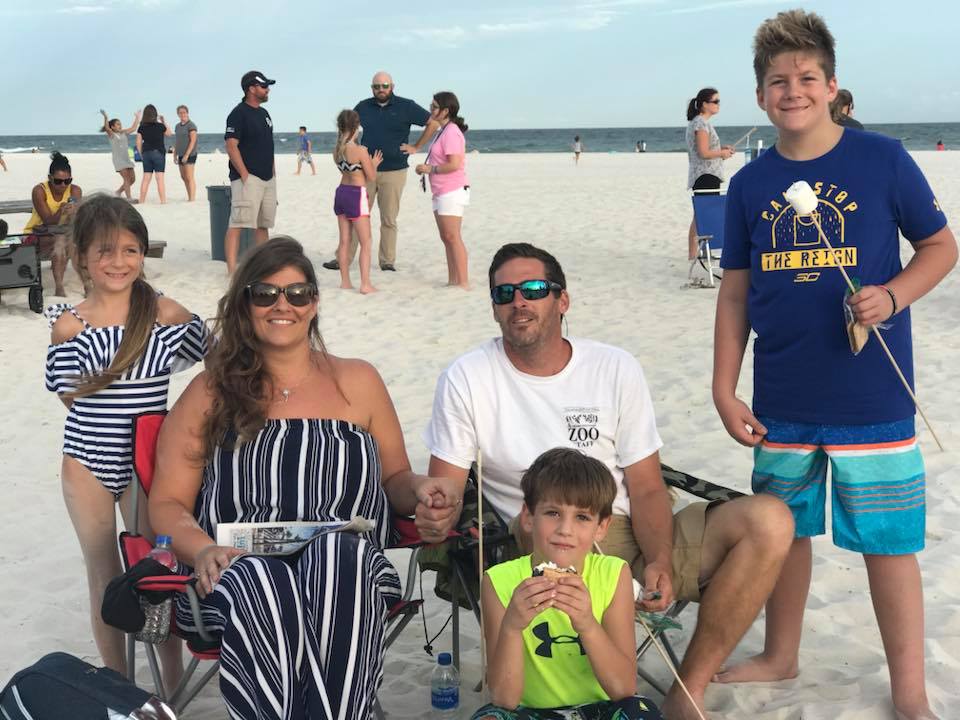 family posing for photo