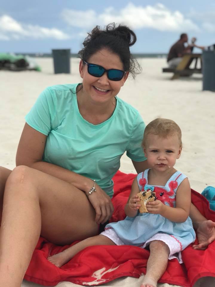 mom and daughter eating smores