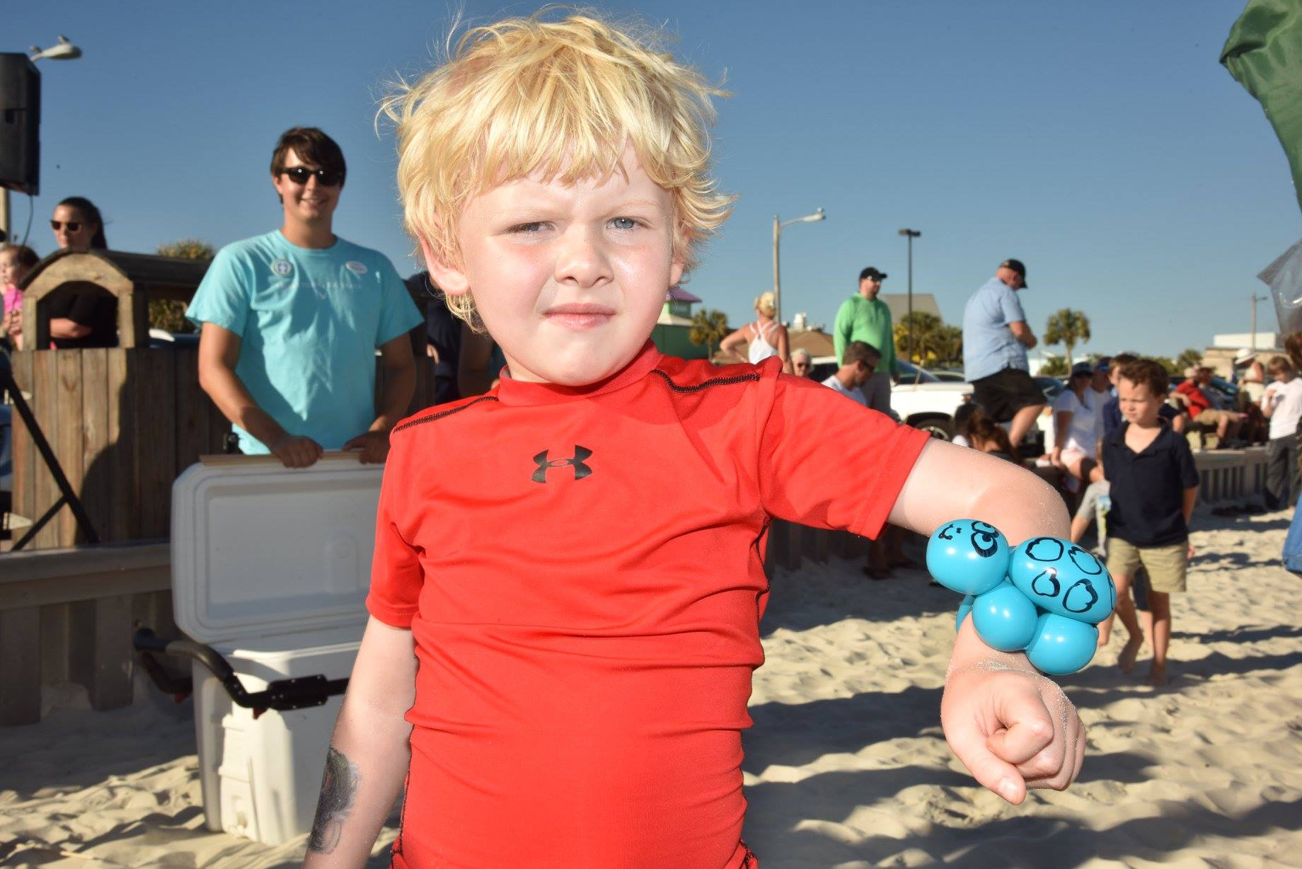 child with balloon animal