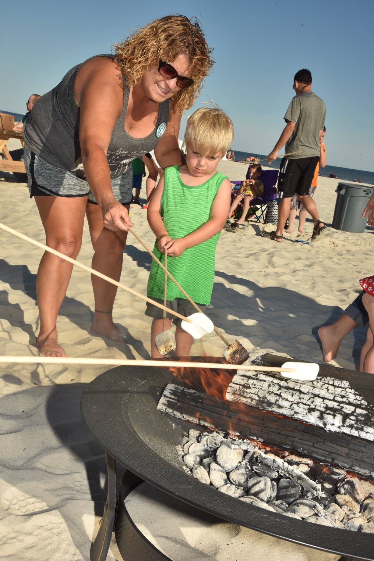 mom and son making smores