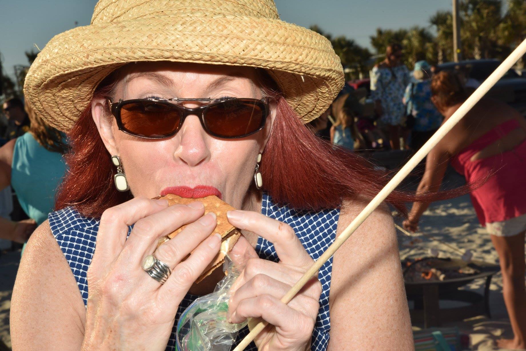 woman eating a smore
