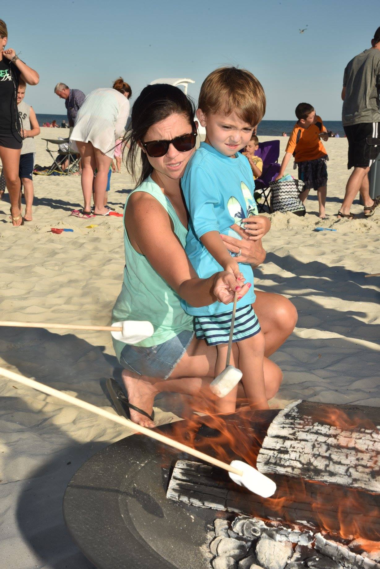 mom and son making smores