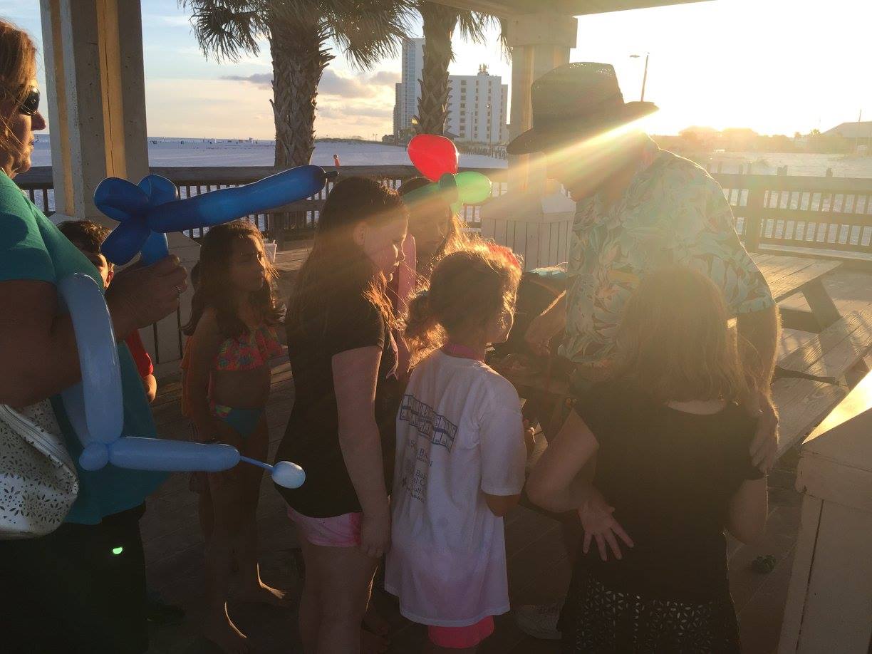 man making balloon animals