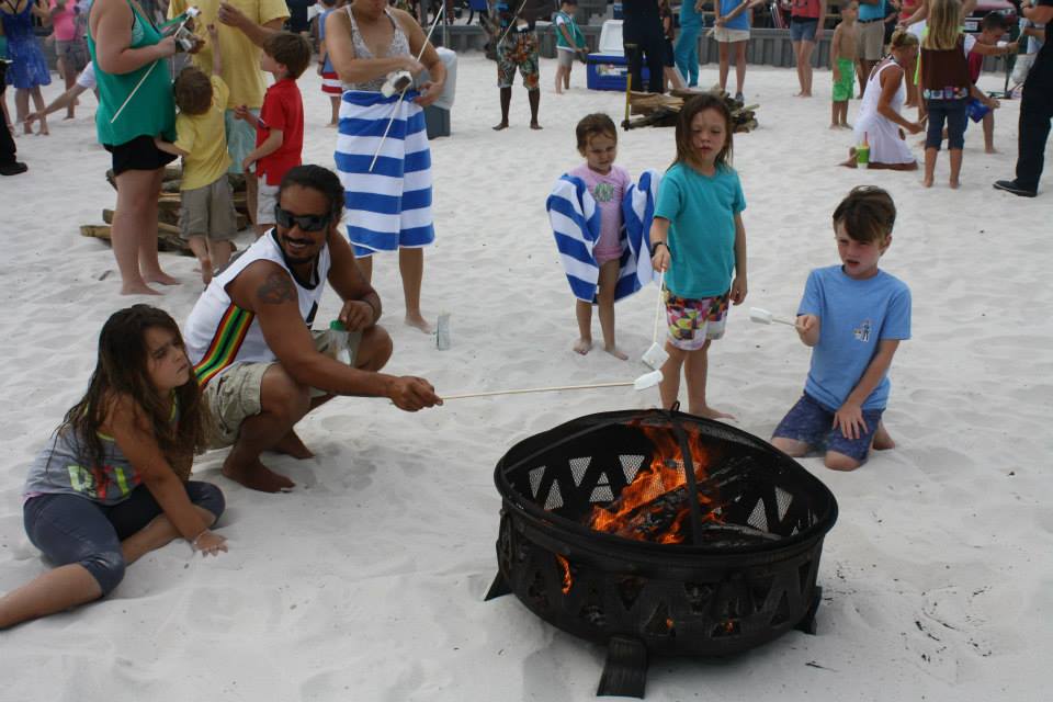group roasting marshmellows