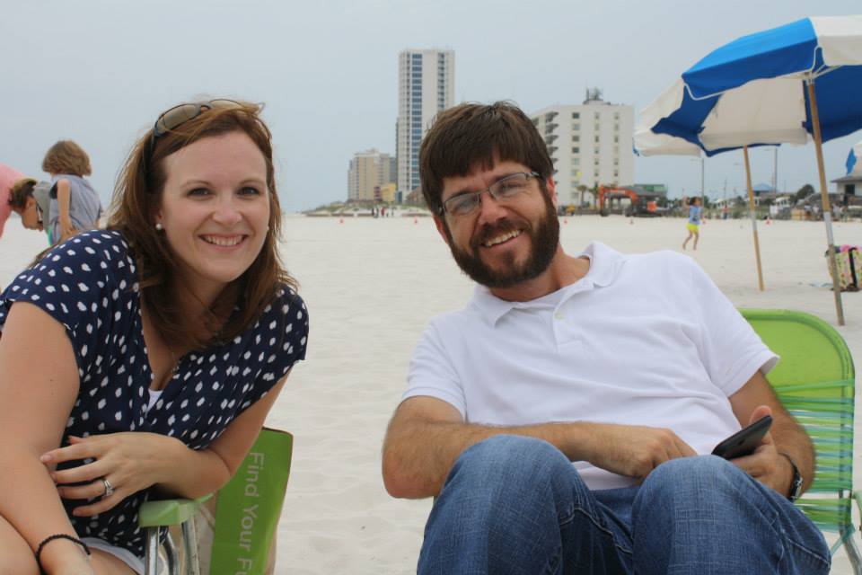 couple smiling on the beach
