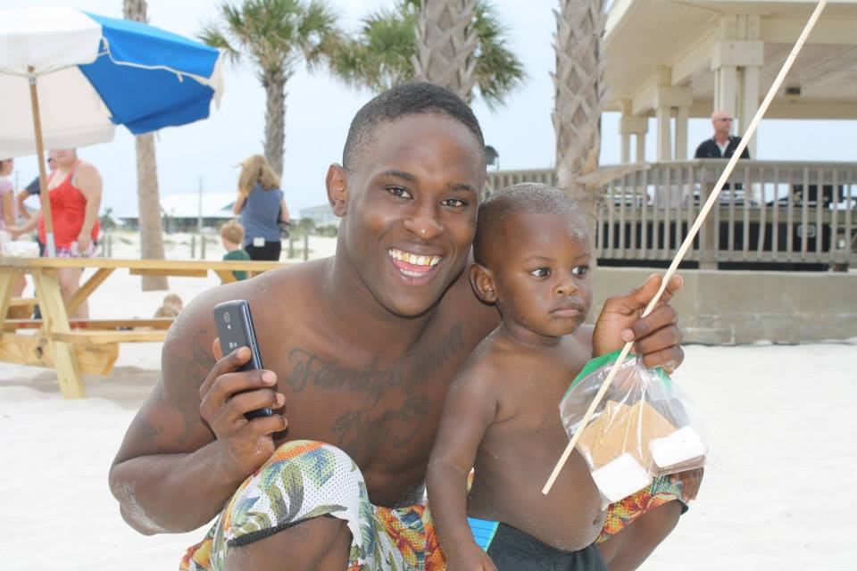 father and son with smores