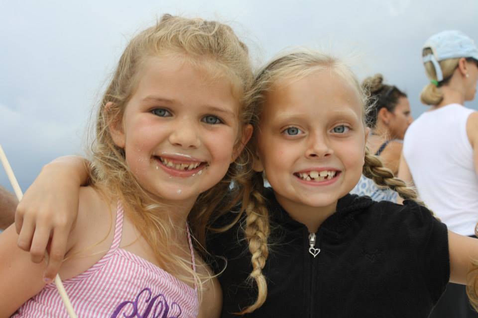 two girls smiling