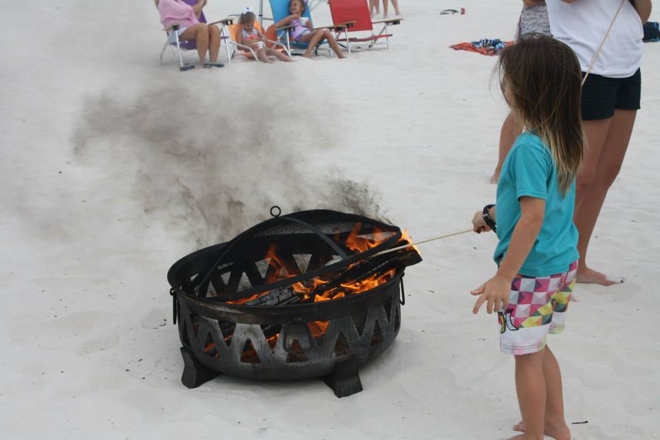 girl roasting a smore