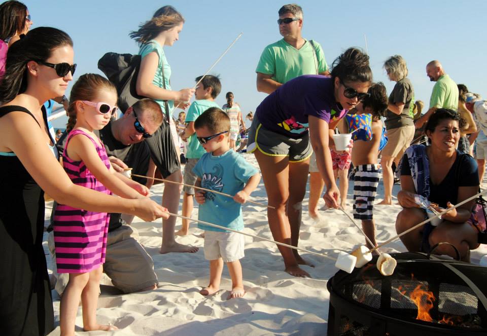 families roasting marshmellows