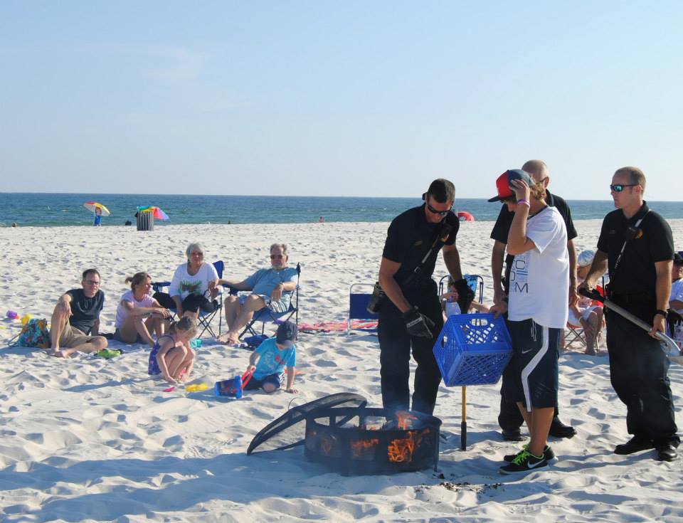 dad feeding his daughter a smore