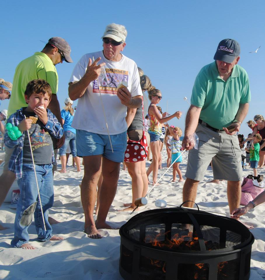 people roasting marshmellows