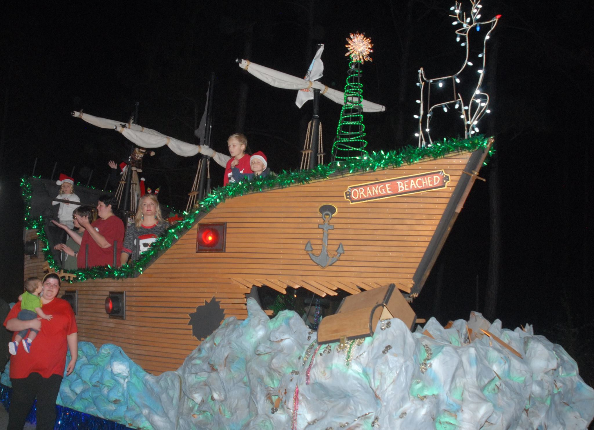 kids participating in parade on float