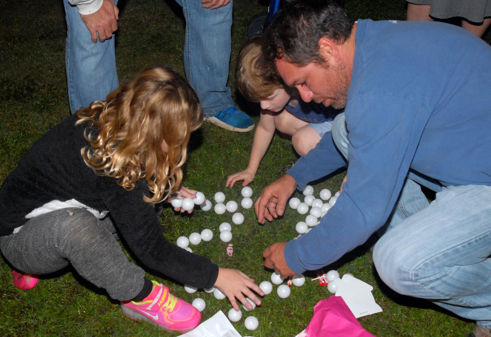 man looking through snowballs