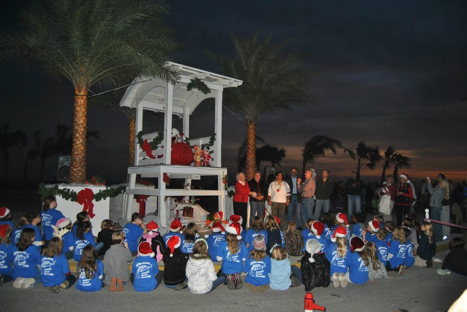 kids watching councilmen on stage