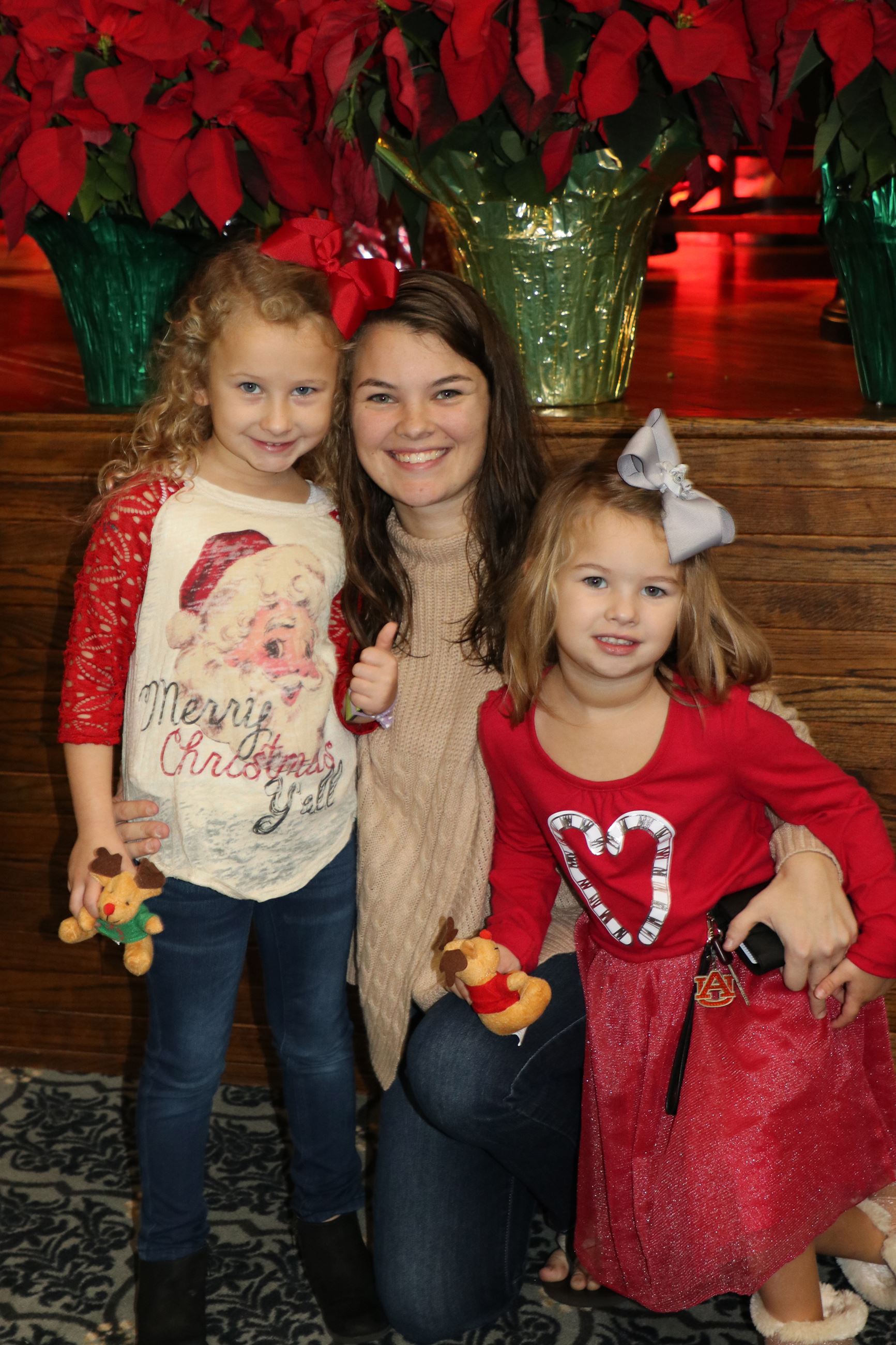 family smiling for photo