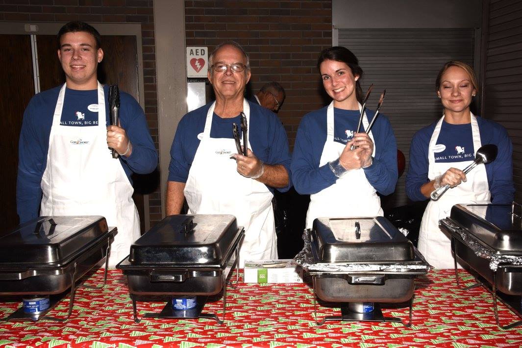 staff working the breakfast buffet