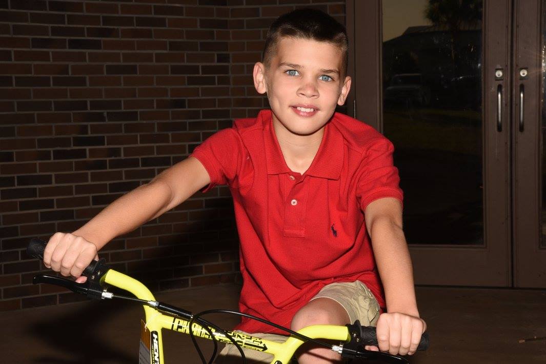 boy on new bicycle
