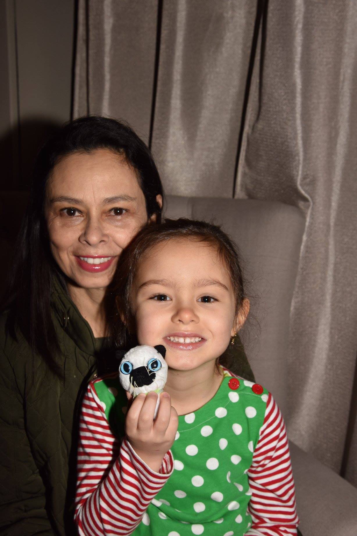 mom and daughter smiling