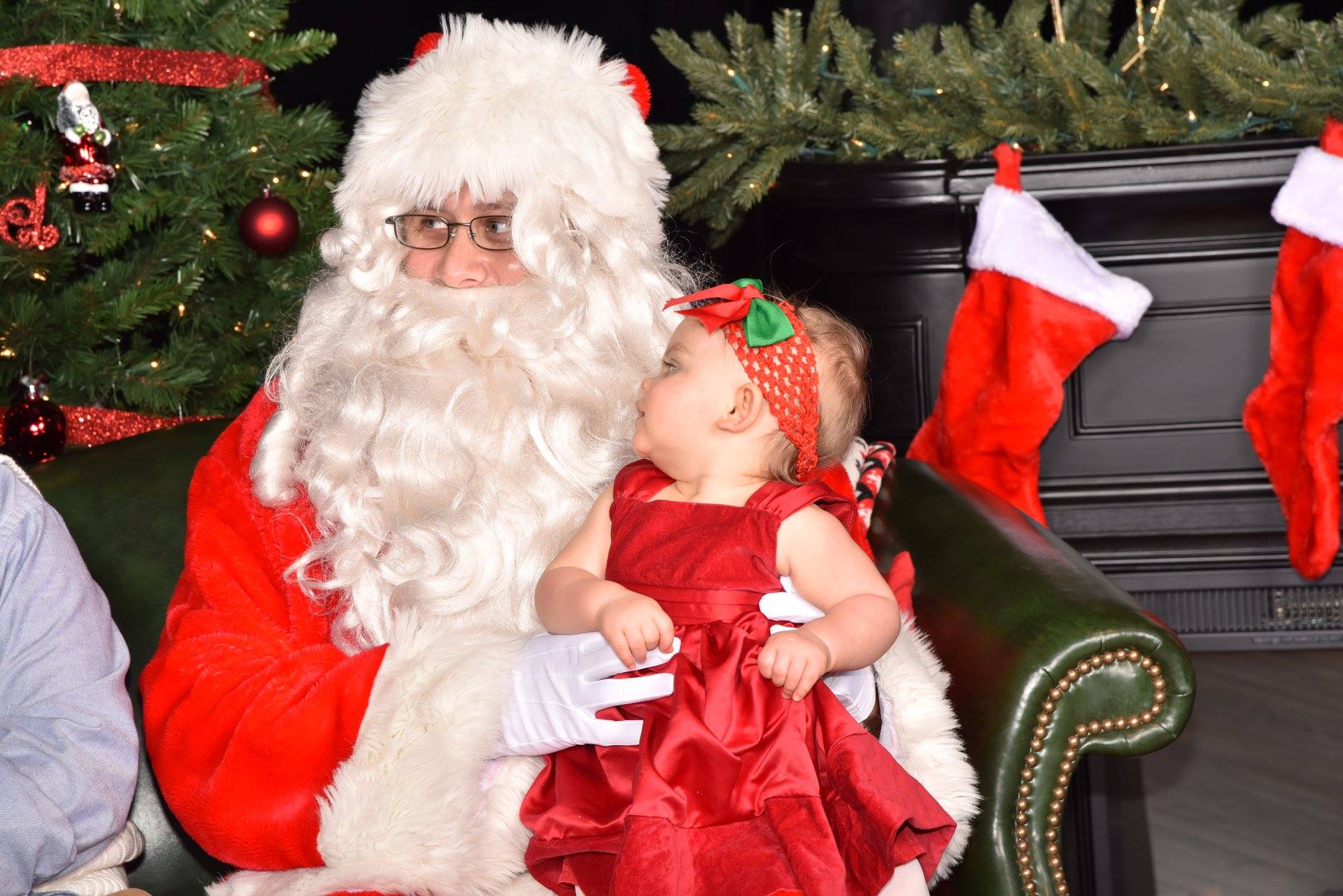 little girl looking at Santa