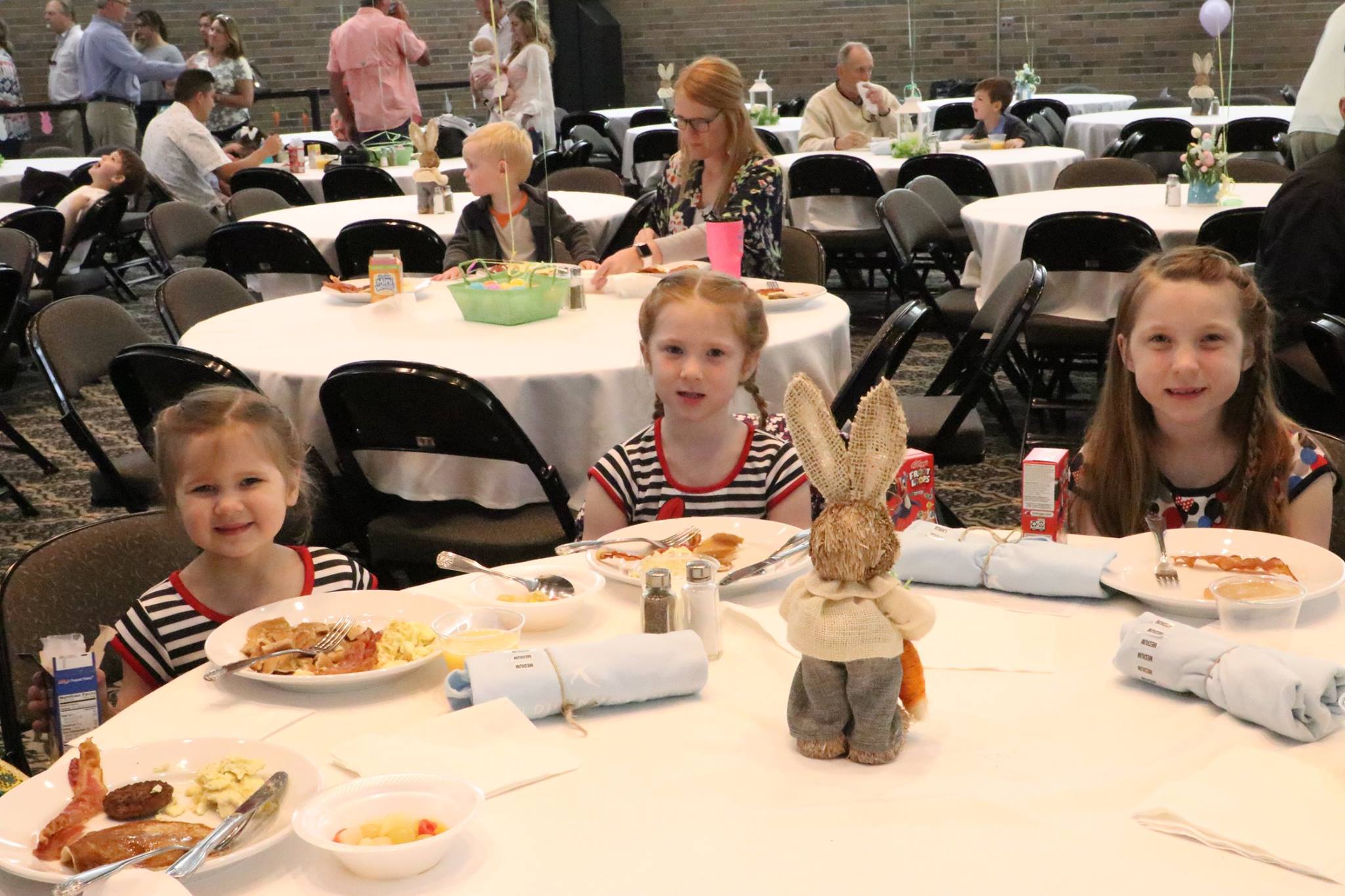 three children smiling
